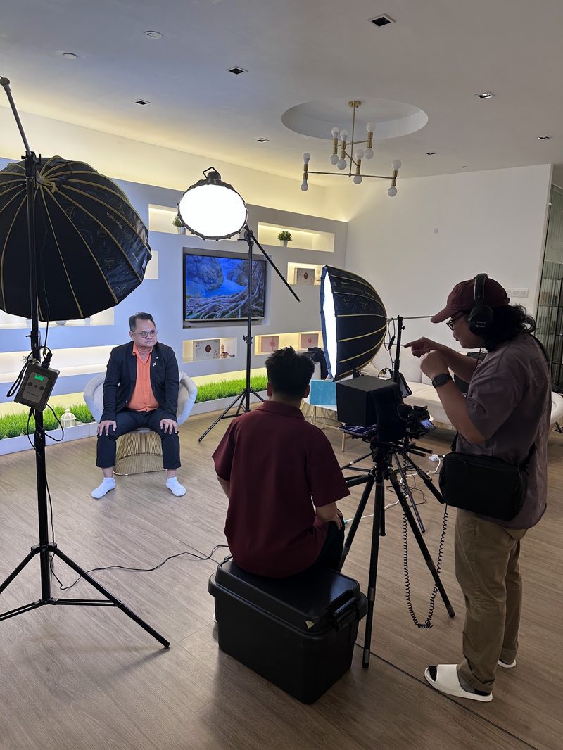 Professional lighting and camera on a client shoot