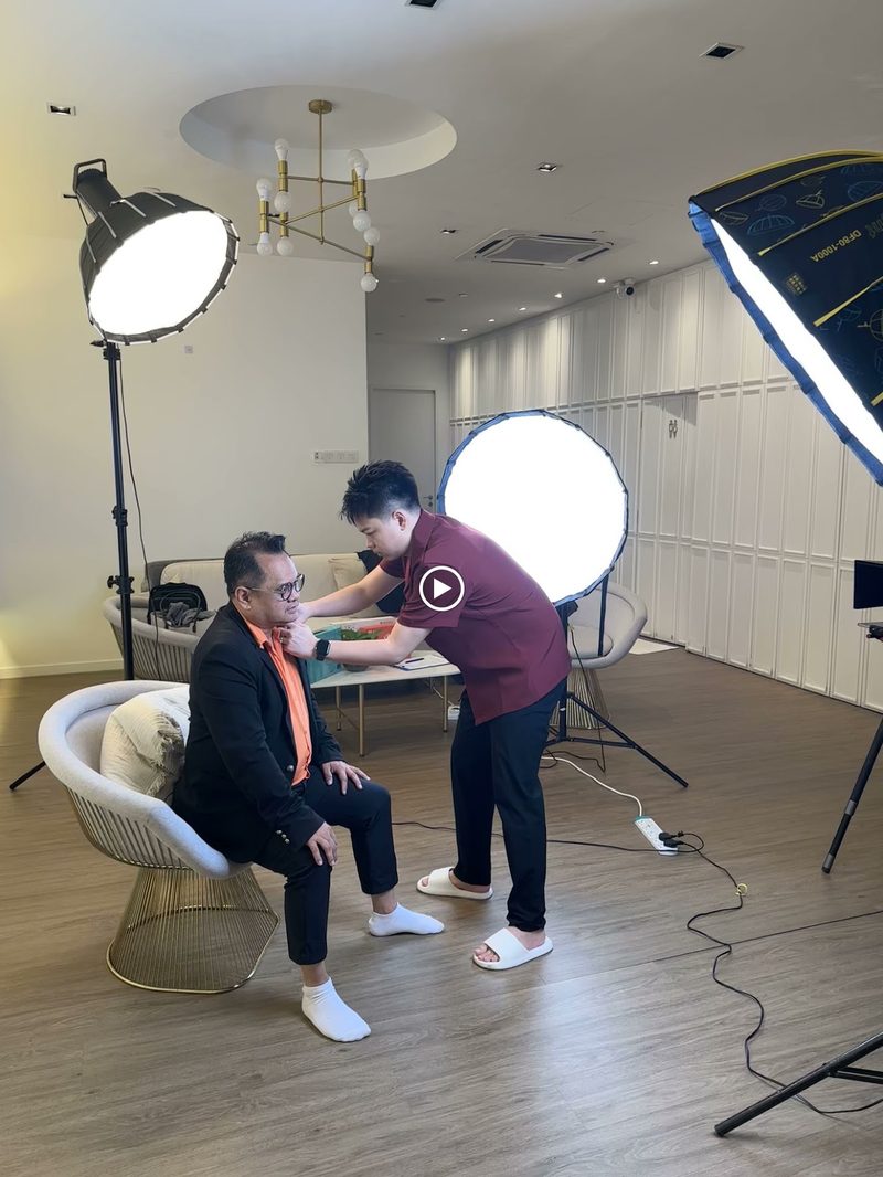 Ring-light studio setup filming a client