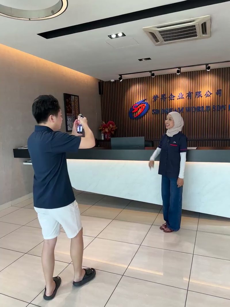 Filming staff at a client's front desk