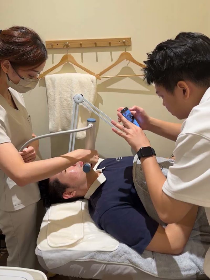 Filming a facial treatment for a clinic ad